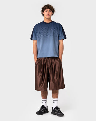 Man wearing Vinsanity Elastic Basketball Short in Brown
