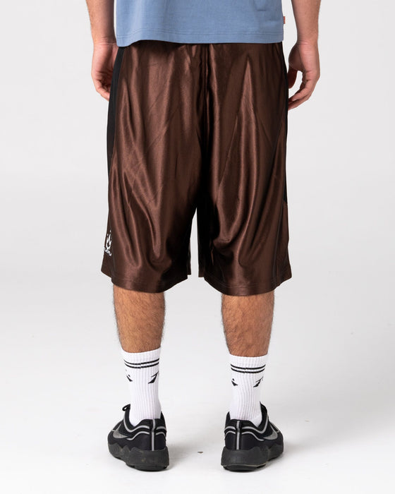 man-wearing-vinsanity-elastic-basketball-short-in-brown