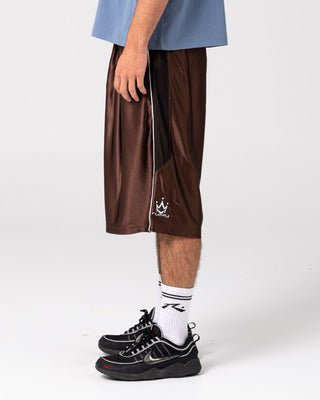 Man wearing Vinsanity Elastic Basketball Short in Brown