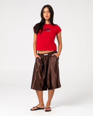 Man wearing Vinsanity Elastic Basketball Short in Brown