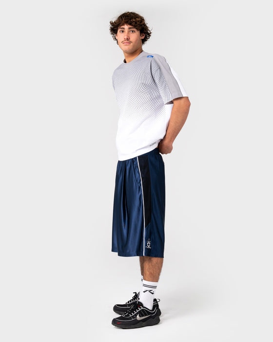man-wearing-vinsanity-elastic-basketball-short-in-navy-blue