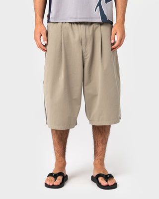 Man wearing Mista Ilavaline Elastic Short in Putty