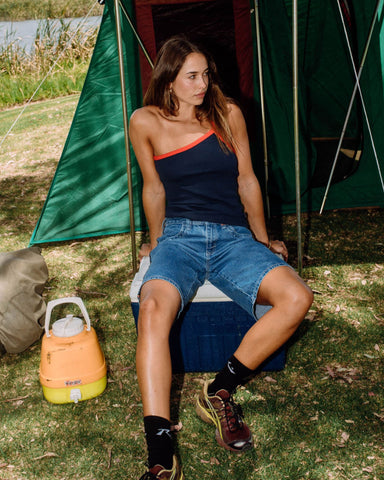 Woman wearing Sling One Shoulder Contrast Skimmer Tank in Navy