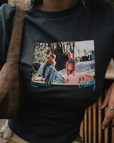 Woman wearing Photo Skimmer Baby Tee in Coal