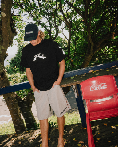 Man wearing Comp Revolution X Short Sleeve Tee in Black