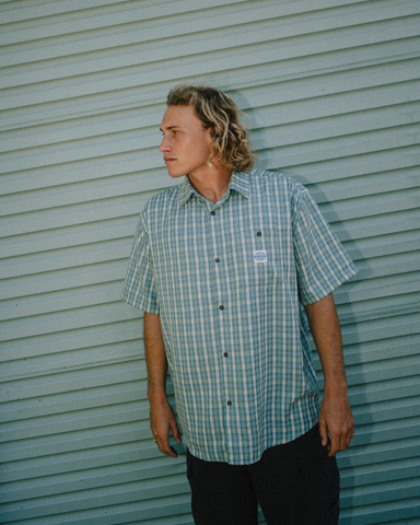 Man wearing Worldwide Curved Hem Short Sleeve Shirt in China Blue