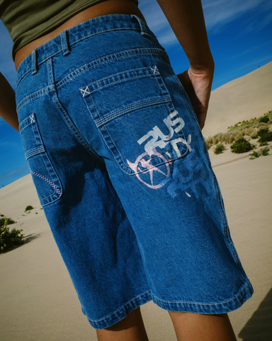 Woman wearing Rock Hot Low Rise Denim Jorts in Blue