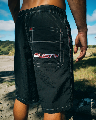 Man wearing Flip Daddy Boardshort in Black