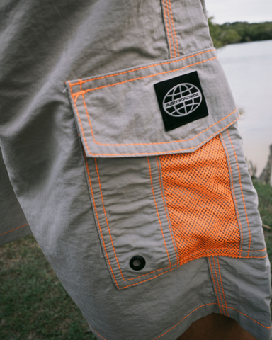 Man wearing Tech Mechanisms Boardshort in Oyster Grey