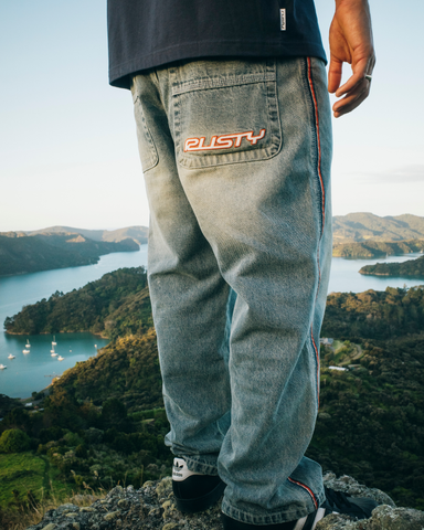 Man wearing Flip Daddy 2.0 Jean - Dirty Dawg in Blue