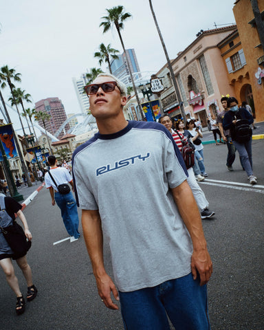 Man wearing Straight Shooter Short Sleeve Tee in Grey Marle