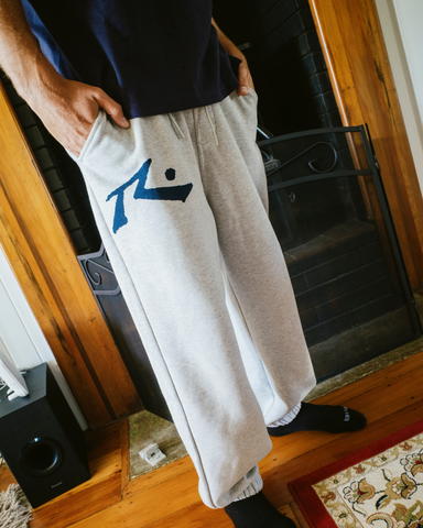 Man wearing Competition Revolution Trackpant in Grey