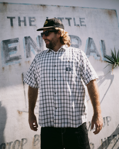 Man wearing Worldwide Curved Hem Short Sleeve Shirt in White