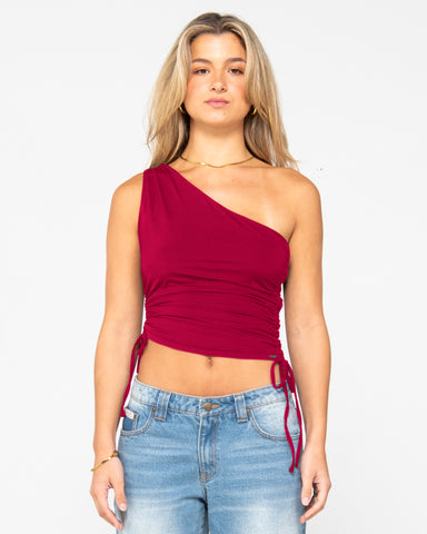 Woman wearing Lani One Shoulder Rouched Top in Rhubarb