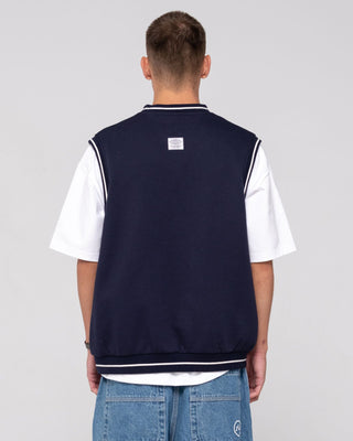 Man wearing Drop Top V Neck Fleece Vest in Navy Blue