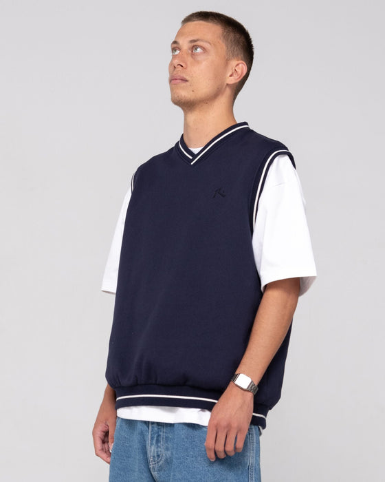 man-wearing-drop-top-v-neck-fleece-vest-in-navy-blue