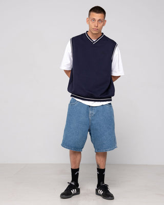 Man wearing Drop Top V Neck Fleece Vest in Navy Blue