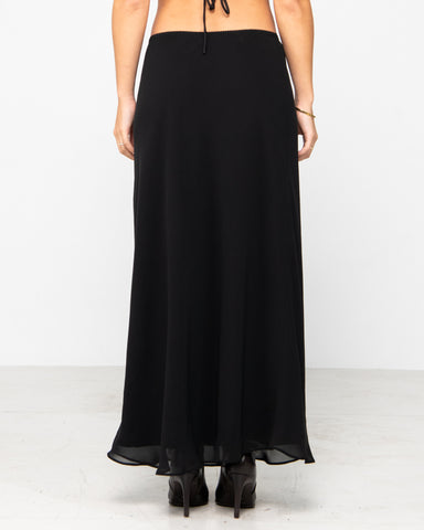 Woman wearing Midnights Low Rise Maxi Skirt in Black