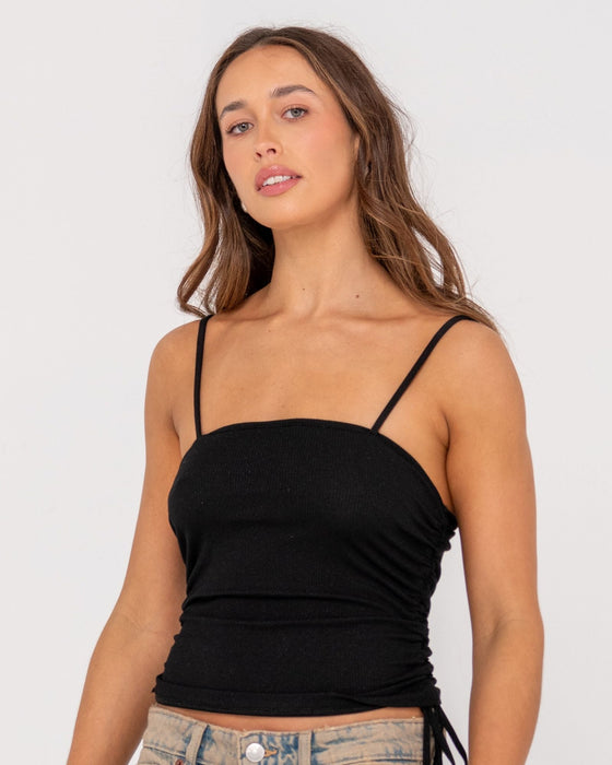 woman-wearing-ikos-rouched-sparkle-top-in-black