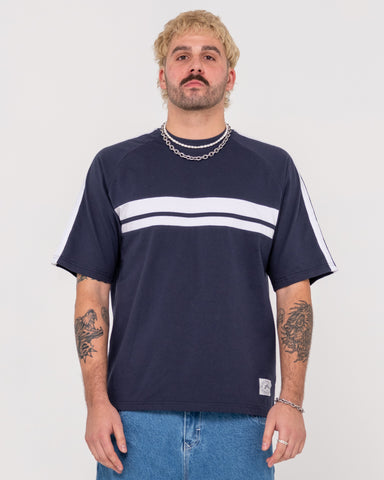 Man wearing White Lines Short Sleeve Tee in Navy Blue 2