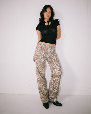 Woman wearing Cheater Cheater Baggy Low Rise Pant in Leopard