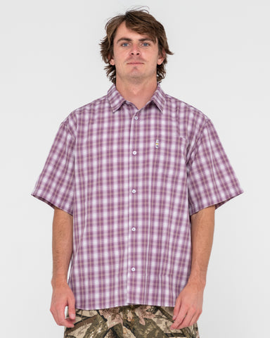 Man wearing Mucho Gusto Short Sleeve Shirt in Elderberry