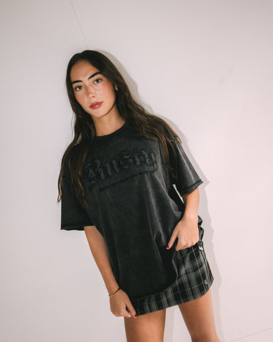 Woman wearing Roxanne Feeln Rusty Oversize Tee in Black