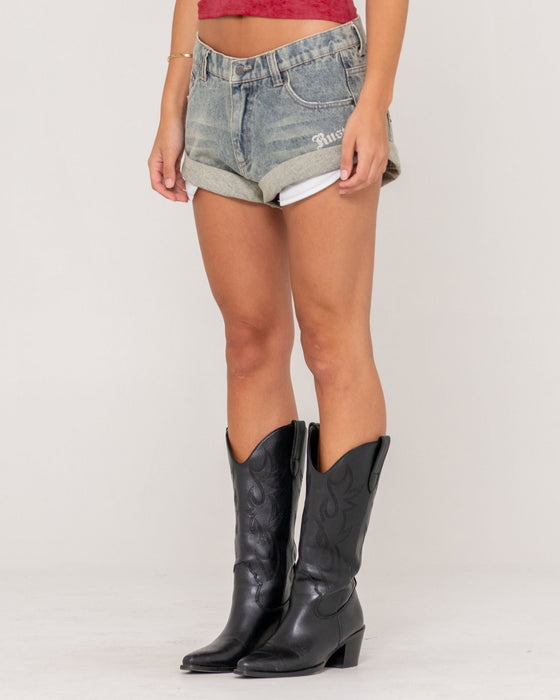 woman-wearing-x-tina-pheonix-low-rise-denim-mini-short-in-dirty-dawg