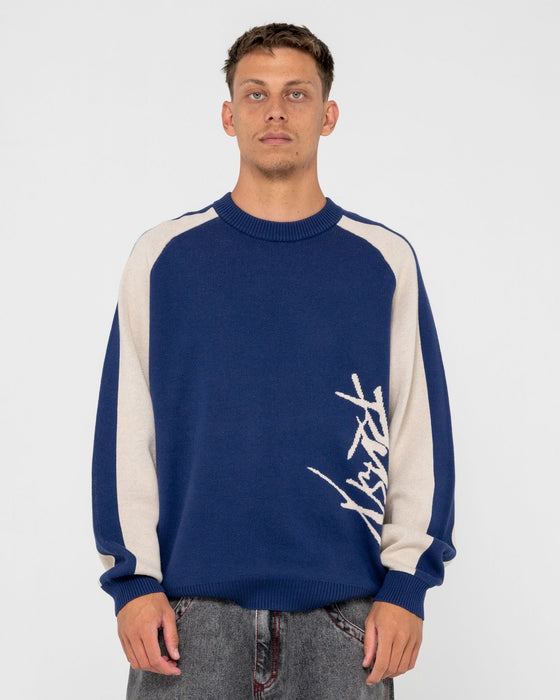 man-wearing-roll-safe-boxy-knitted-crew-in-dark-blue