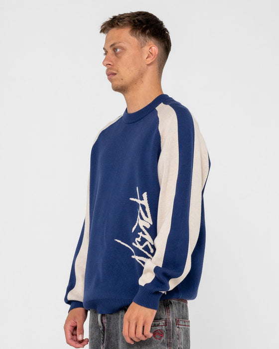 man-wearing-roll-safe-boxy-knitted-crew-in-dark-blue