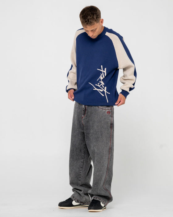 man-wearing-roll-safe-boxy-knitted-crew-in-dark-blue