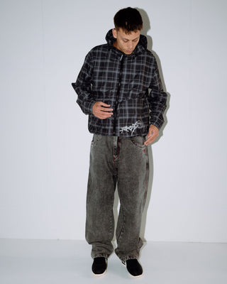 Man wearing Redemption Baggy Jean in Washed Black