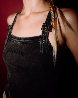 Woman wearing Roxanne Buckle Cami Top in Washed Black