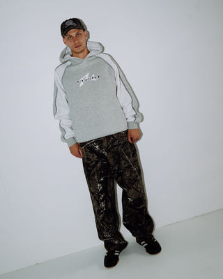 Man wearing Paneka Hooded Fleece in Grey Marle