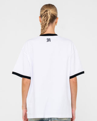 Woman wearing Bedazzled Rusty Ringer Oversize Tee in White