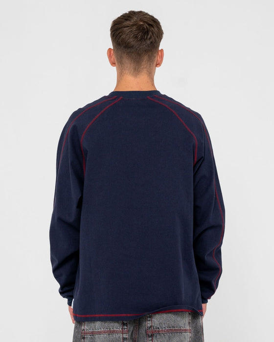 man-wearing-kurupt-long-sleeve-heavy-tee-in-navy-blue