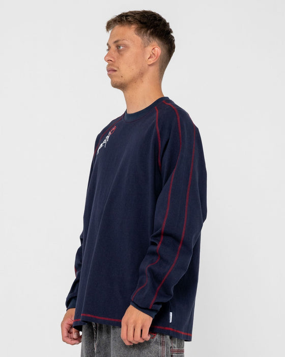 man-wearing-kurupt-long-sleeve-heavy-tee-in-navy-blue