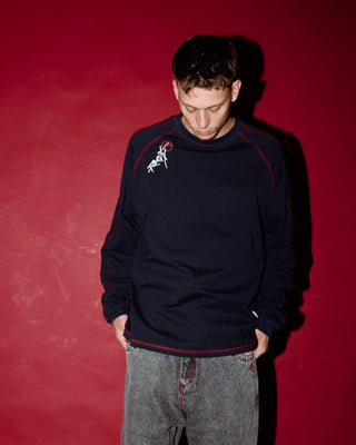 Man wearing Kurupt Long Sleeve Heavy Tee in Navy Blue