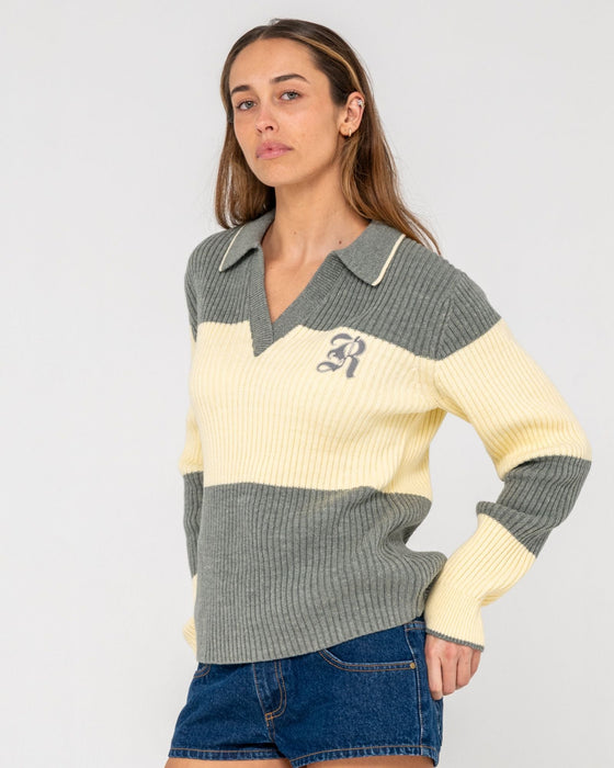 woman-wearing-try-me-knitted-rugby-top-in-yellow-grey