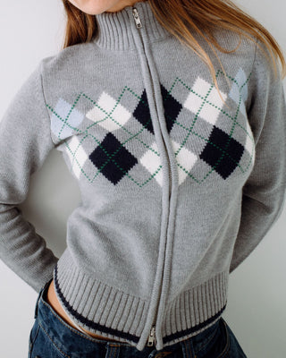 Woman wearing Clued In Zip Through Knit in Grey Marle