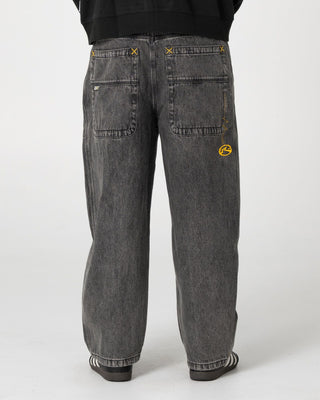 Man wearing Boneyard Cacoon Jean in Washed Black