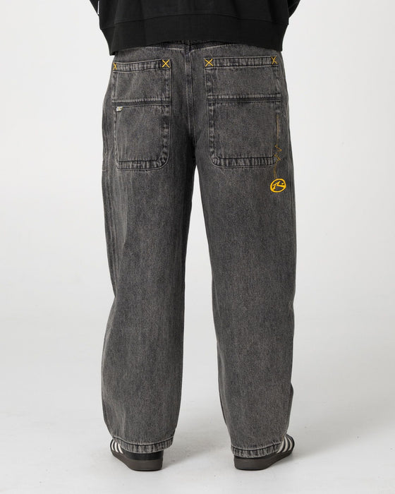 man-wearing-boneyard-cacoon-jean-in-washed-black