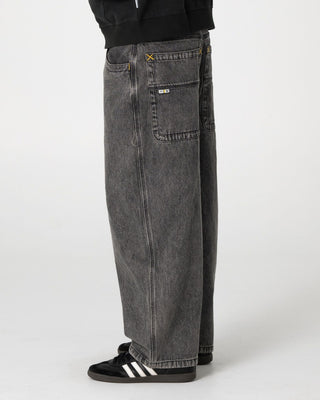 Man wearing Boneyard Cacoon Jean in Washed Black