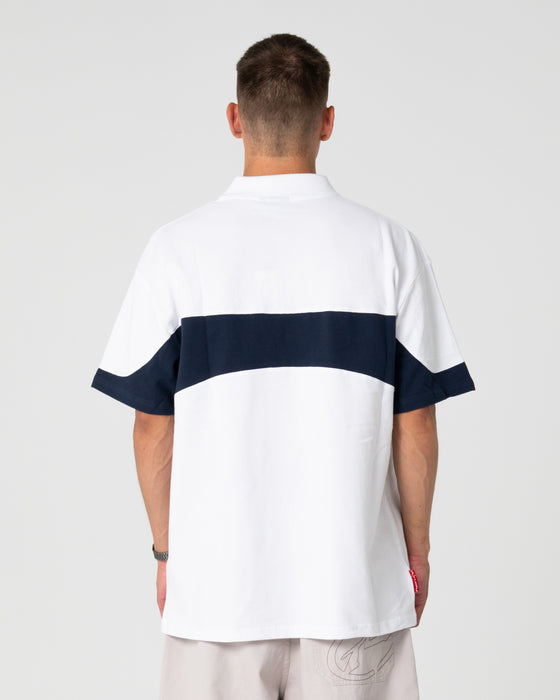 man-wearing-kinetic-polo-in-white