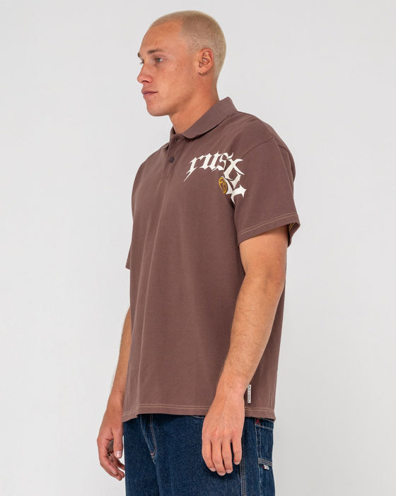man-wearing-blinker-short-sleeve-polo-in-pinecone