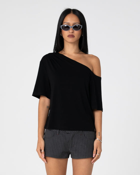 woman-wearing-sally-slouch-off-shoulder-tee-in-black