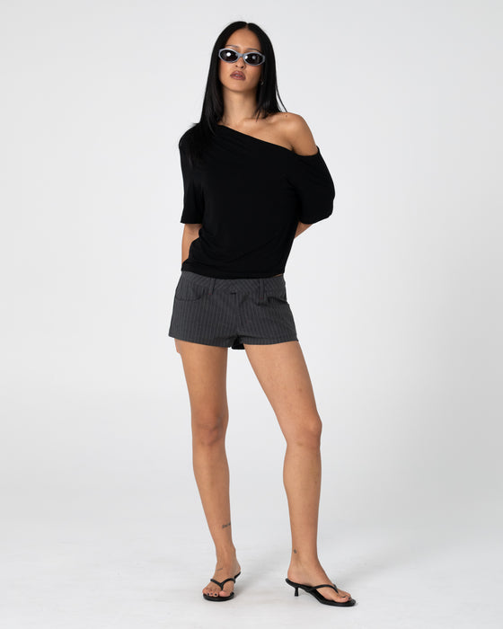 woman-wearing-sally-slouch-off-shoulder-tee-in-black