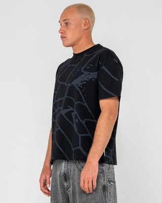 Man wearing Taipan Short Sleeve Tee in Black