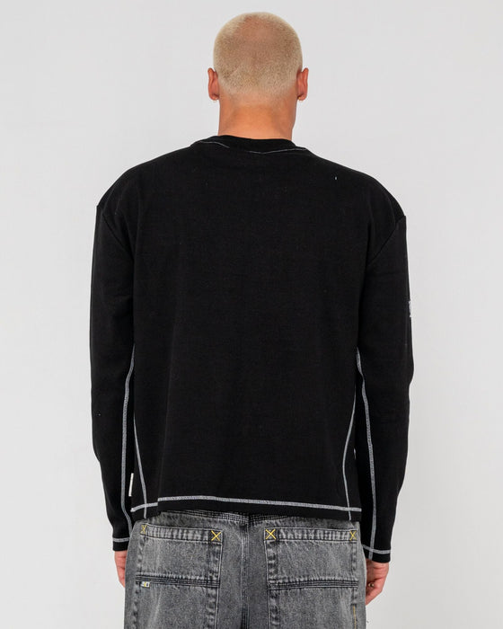 man-wearing-slack-jack-long-sleeve-heavy-tee-in-black