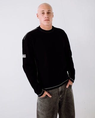 Man wearing Slack Jack Long Sleeve Heavy Tee in Black